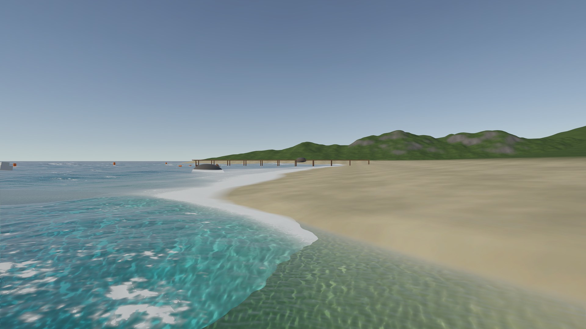 Turquoise water breaking into white surf along a sandy beach, with a wooden pier and green hills in the distance